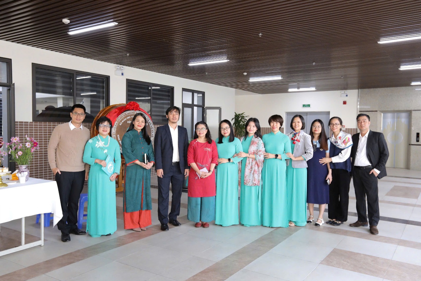 A group of people standing togetherDescription automatically generated