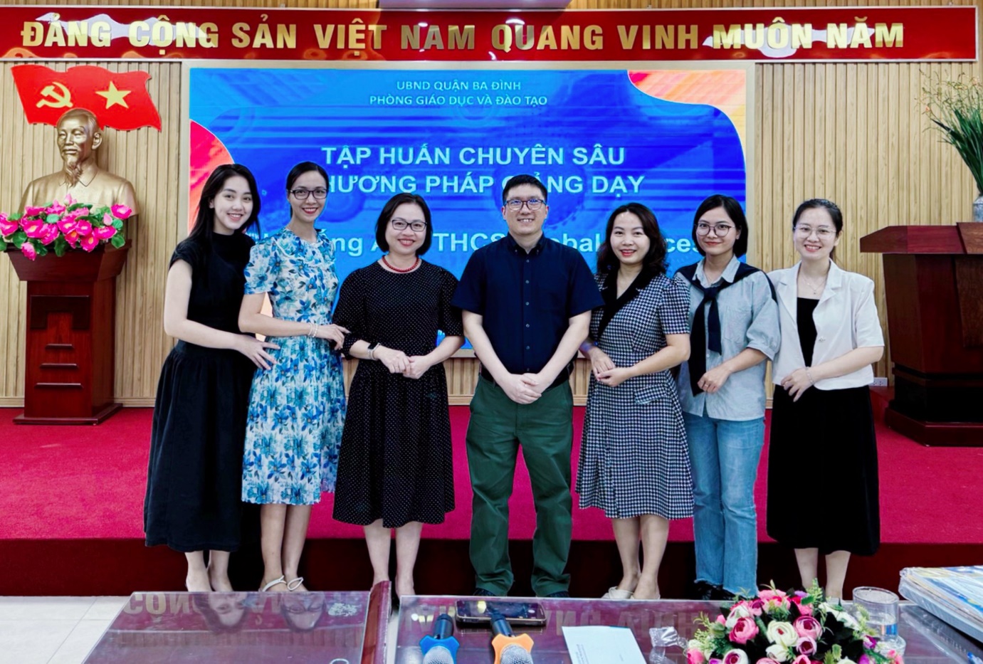 A group of people standing togetherDescription automatically generated