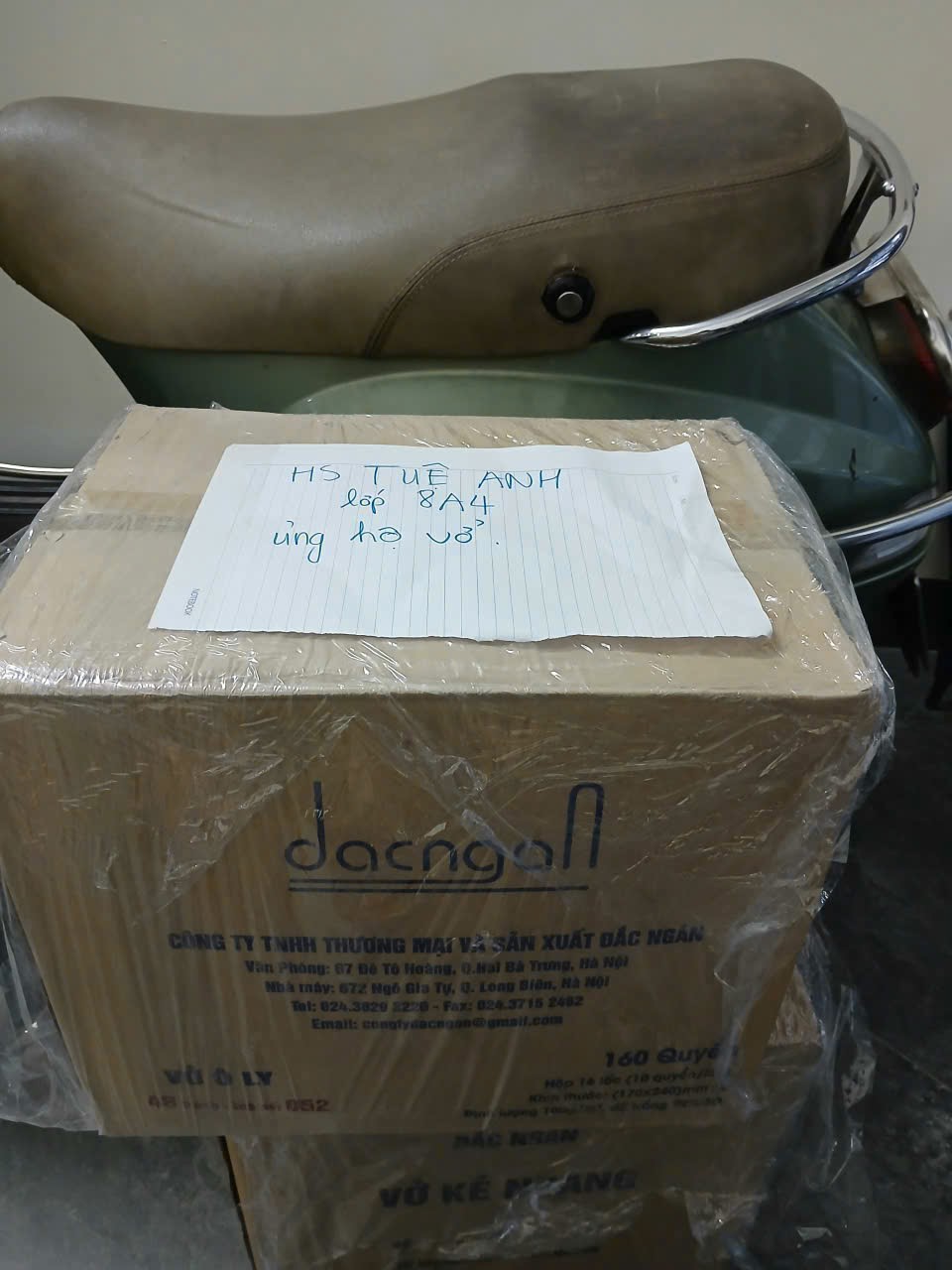 A box with a piece of paper on itAI-generated content may be incorrect.