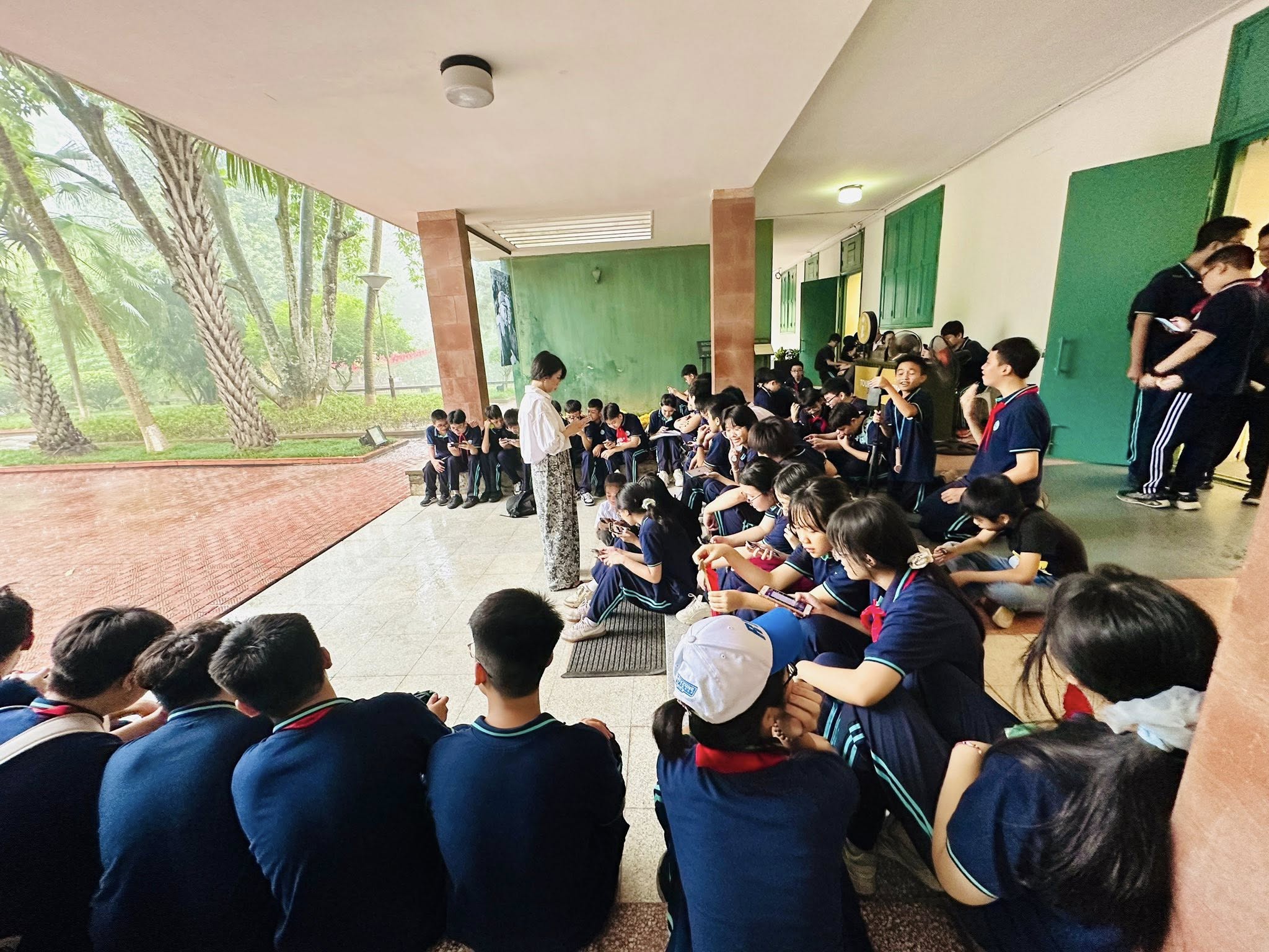 May be an image of one or more people, people studying and text