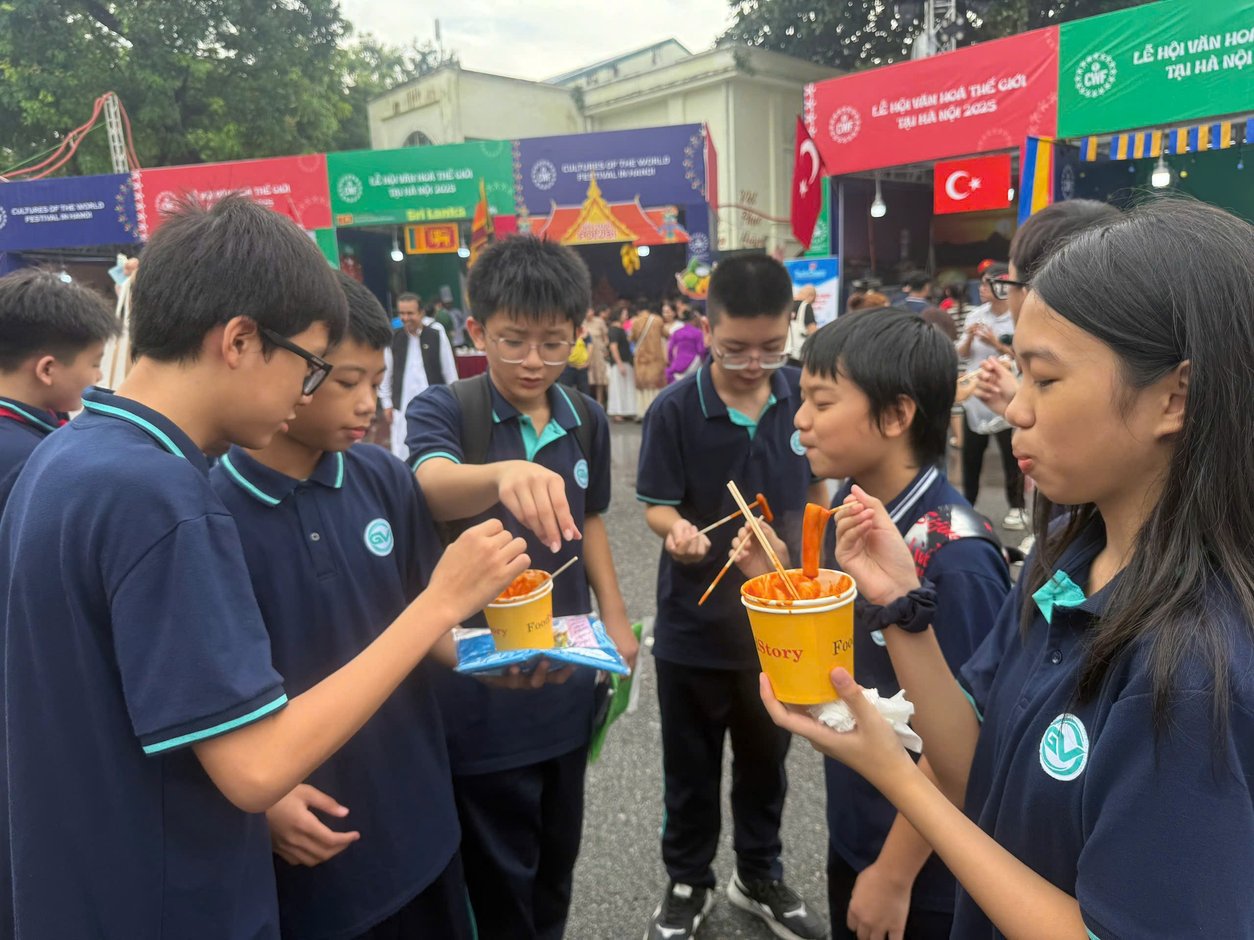 A group of people eating foodAI-generated content may be incorrect.