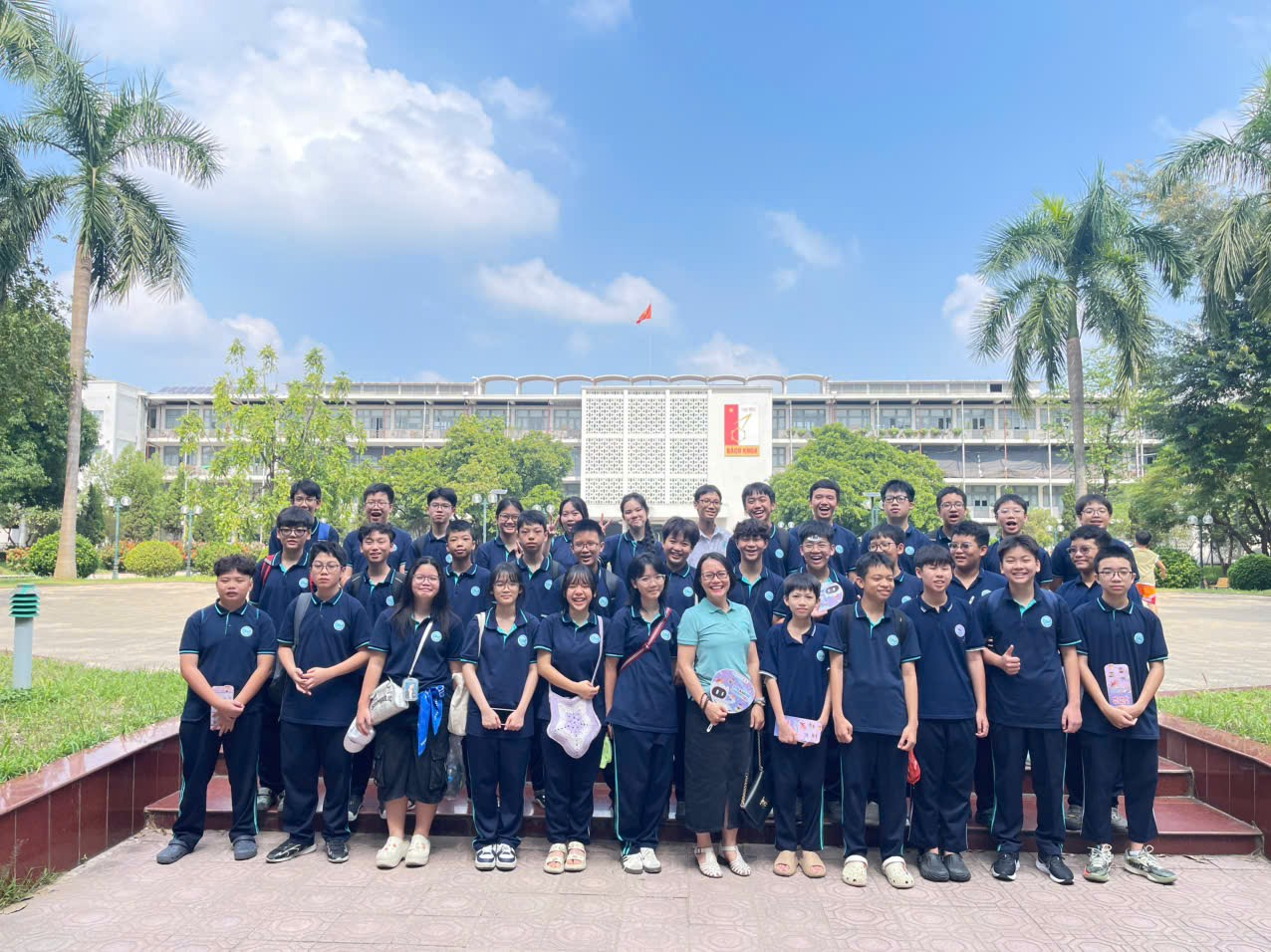 A group of people posing for a photoAI-generated content may be incorrect.