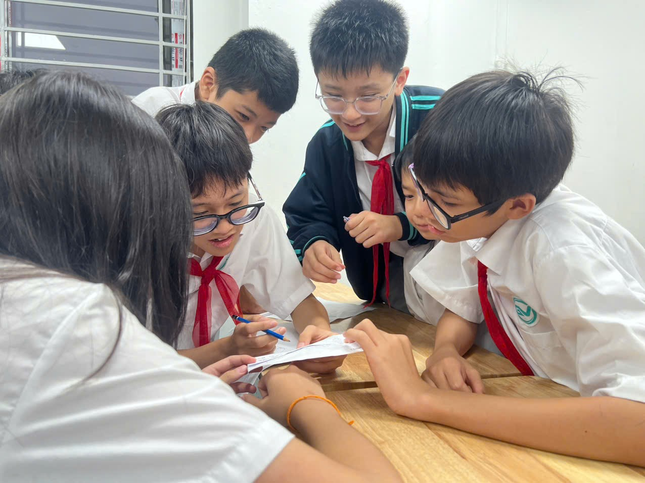 A group of children in white shirtsAI-generated content may be incorrect.