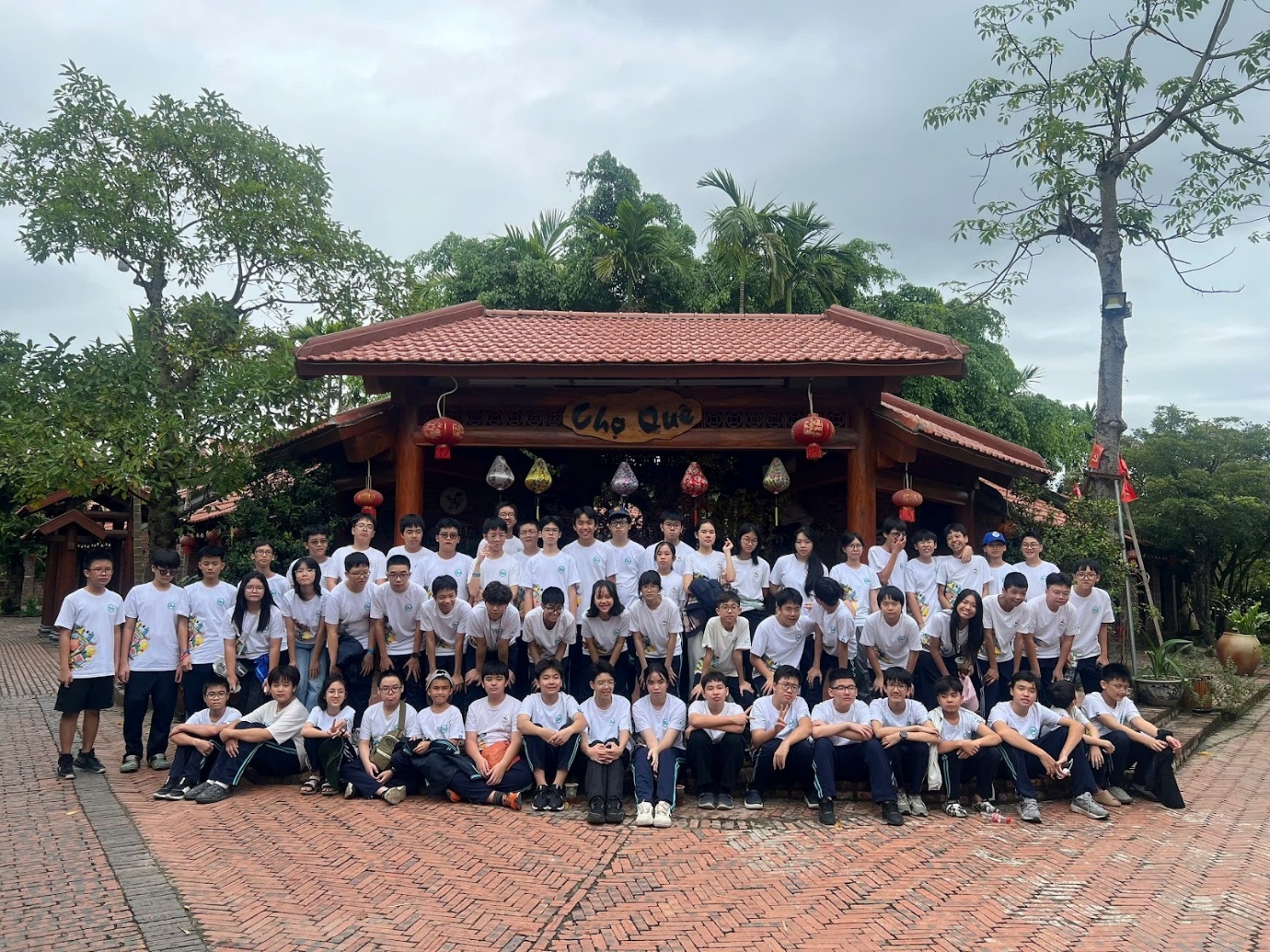 A group of people posing for a photoAI-generated content may be incorrect.