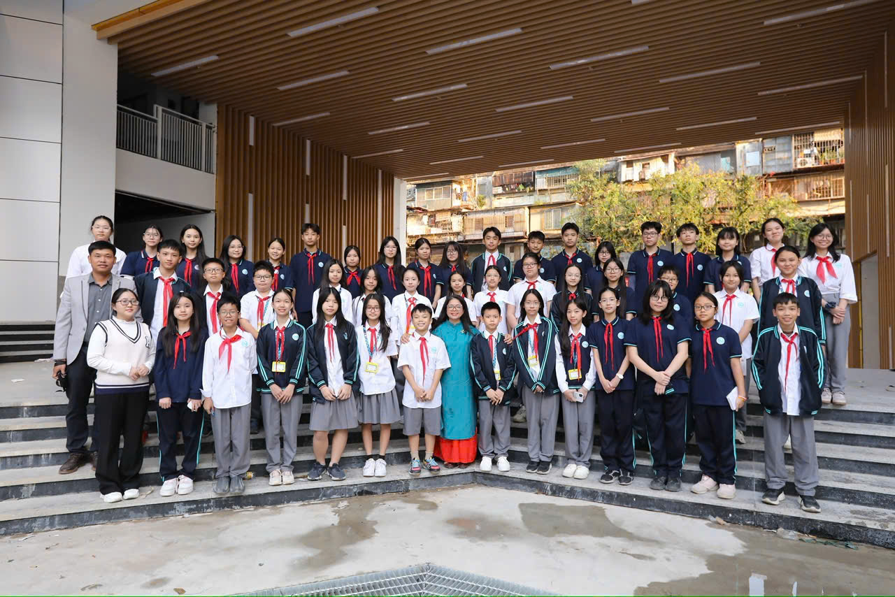 A group of people posing for a photoAI-generated content may be incorrect.