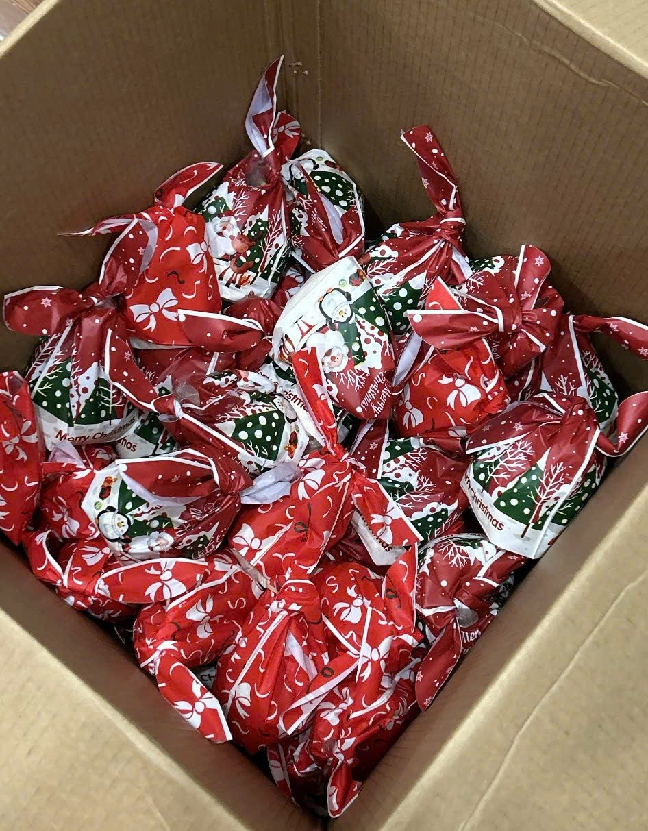 A box full of wrapped candyDescription automatically generated
