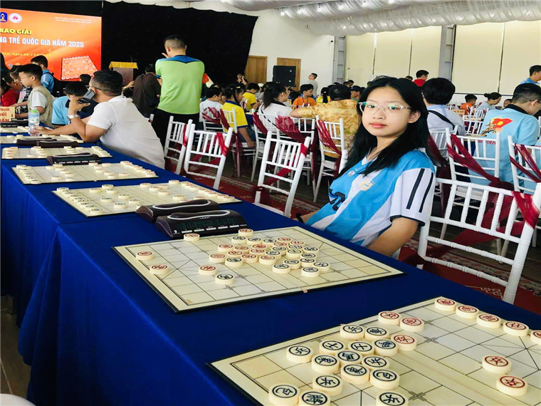 A group of people sitting at tables with a table with a game boardAI-generated content may be incorrect.