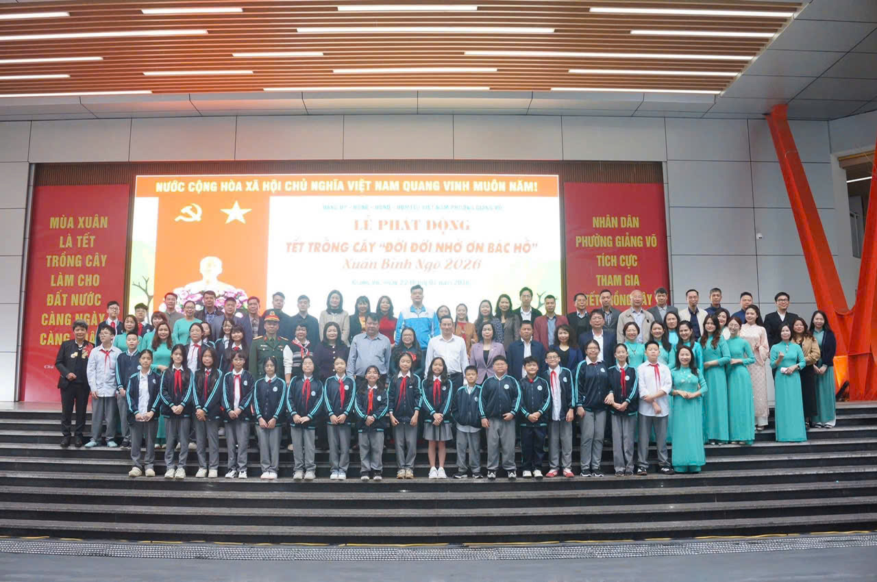 A group of people standing on stepsDescription automatically generated