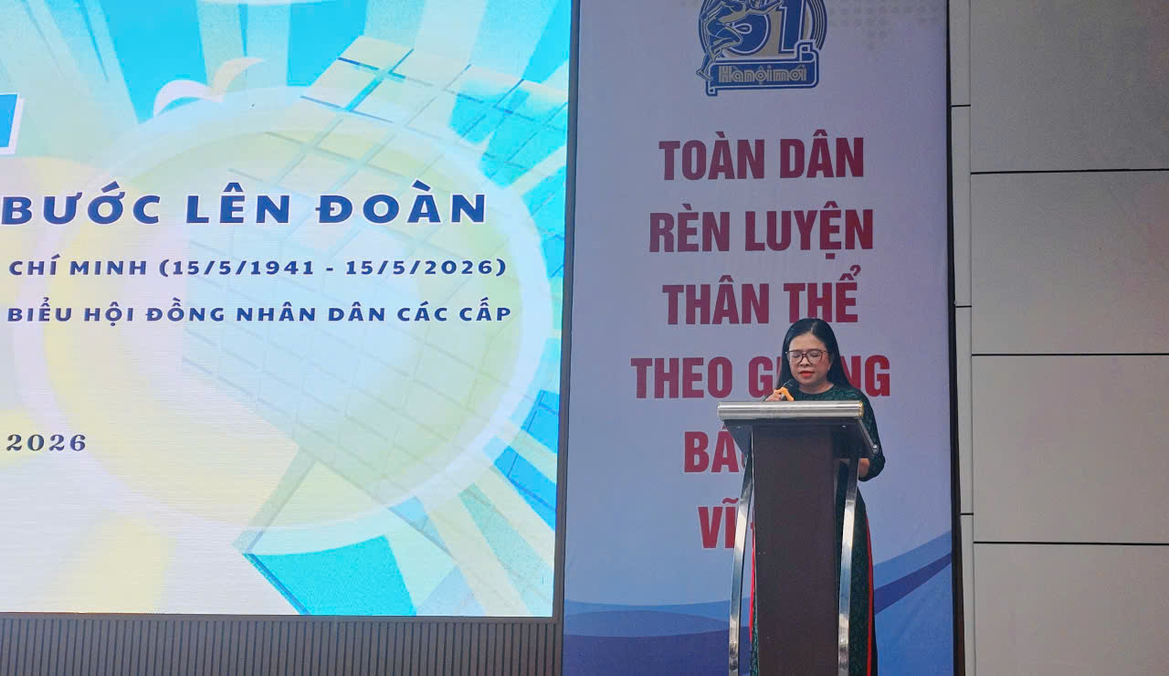 A person standing at a podiumDescription automatically generated